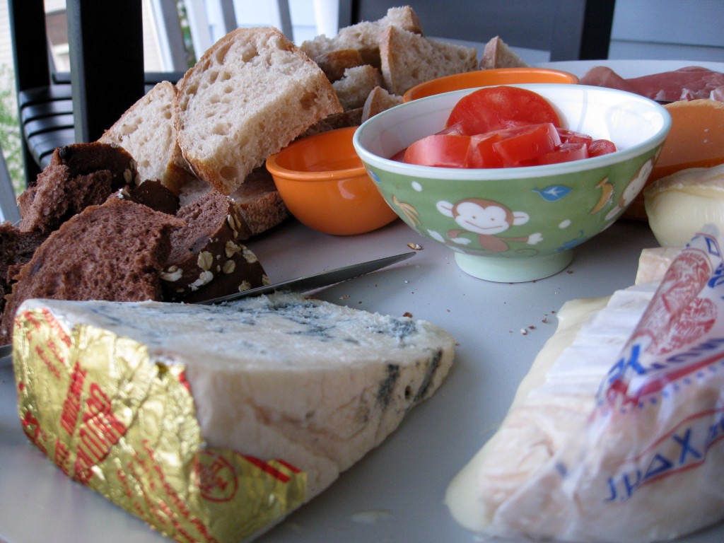 CheesePlateUpClose Gorgonzola, Munster, and Tomatoes