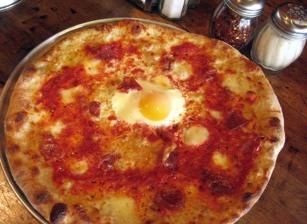 Supino Pizzeria's Bismarck pizza with fresh mozzarella, prosciutto, tomato sauce and a sunnyside egg